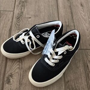 Vans Kids Black and White Canvas Sneakers